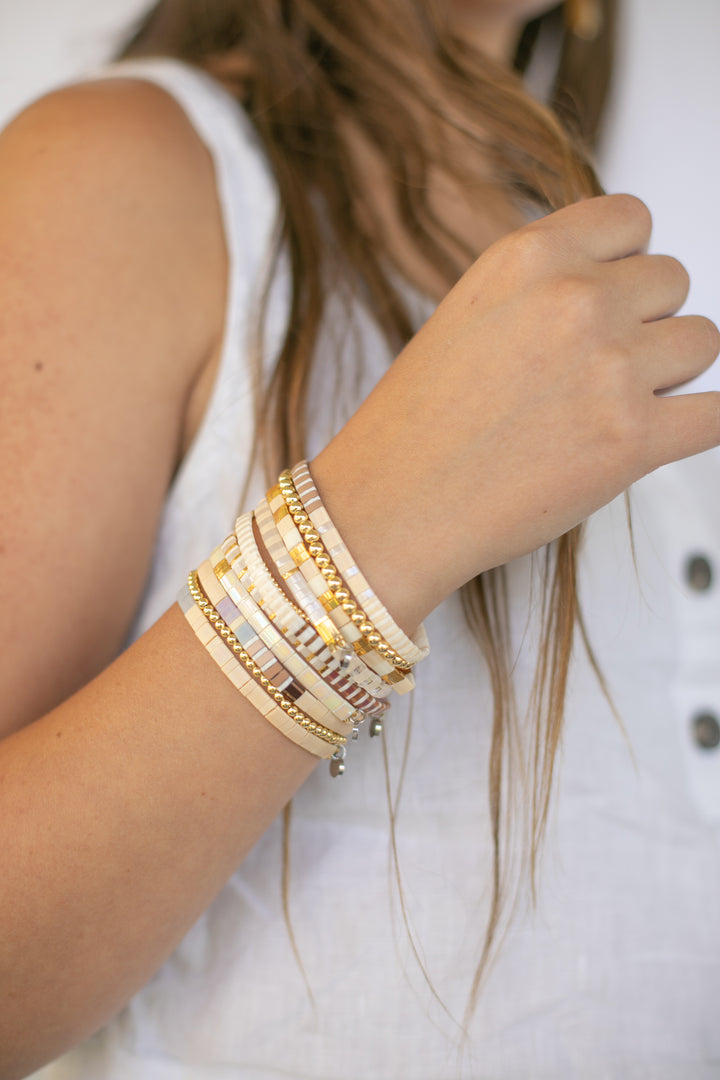 BIG SUR Bracelet Stack | Creamy Beige, with Grey, and Shimmering Brown Accents. The perfect neutral beaded bracelet made with quality glass beads.