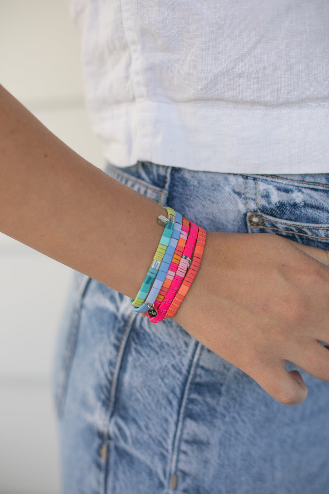 Your best vacation accessory is the BAJA Bracelet Stack featuring 5 bright beachy color tones.