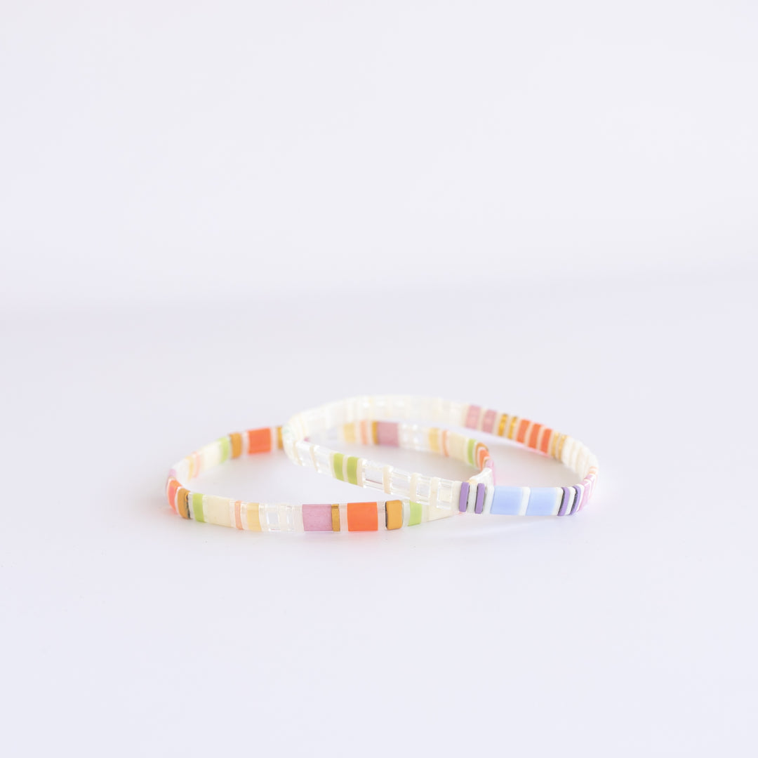 VENICE Bracelet Stack featuring two stretch glass bead bracelets in vibrant pastel colors.