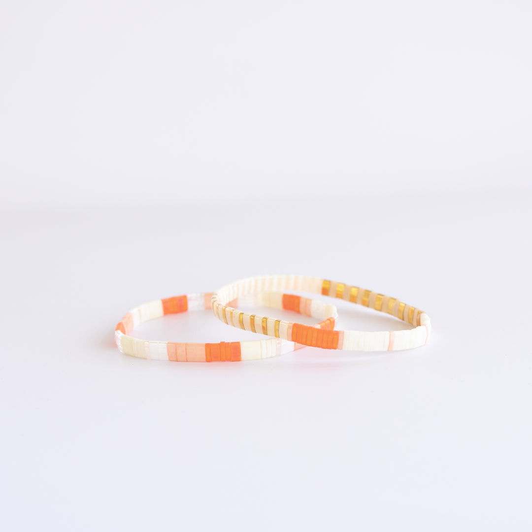 Stretch CATALINA bracelets featuring soft coral, pastel pinks, and gold accents | Current