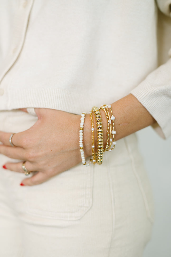 Golden Glow Bracelet Stack! stretch bracelets, beautifully gold and white tones with elegant pearl accents.