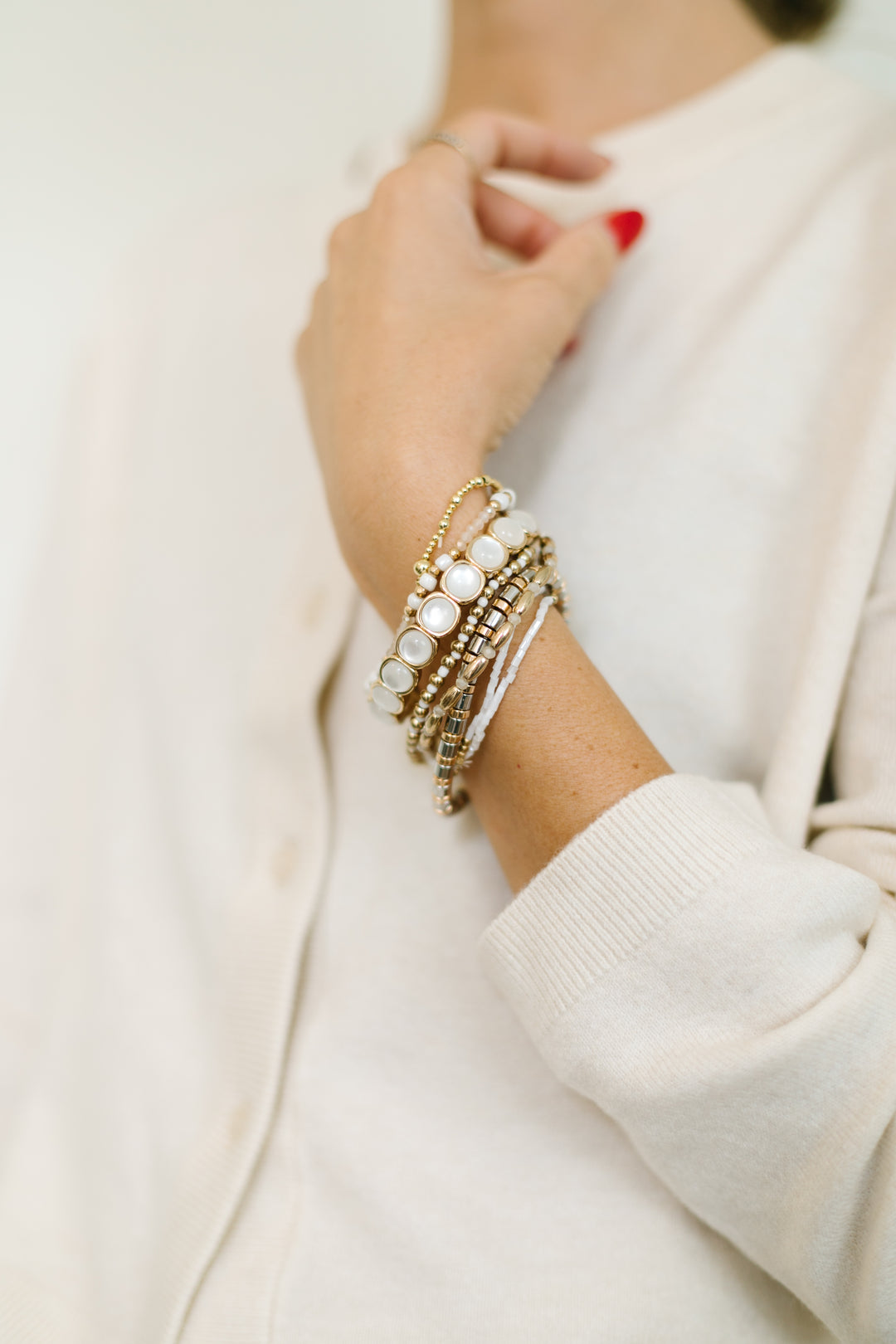 WINTER WHITES CHUNKY BRACELET STACK, SOFT WHITES, SILVER AND GOLD
These WOMENS beaded bracelets are stretchy and comfortable - Shop Current.
