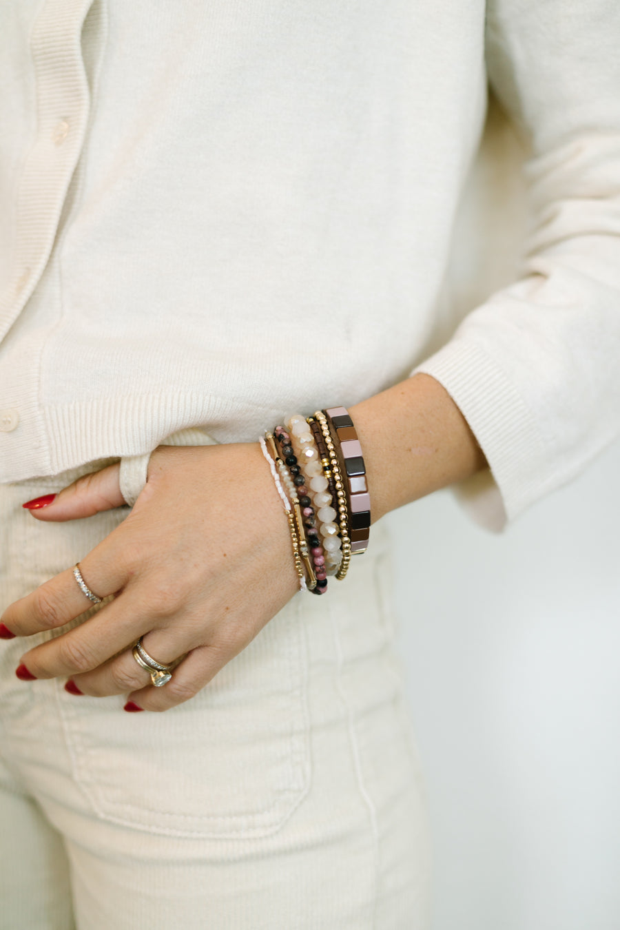 CRANBERRY BRACELET STACK. BOHO bracelets in beautiful earth tones, d with brown, MAUVE and gold accents. Paired with sparkling white jade bracelets