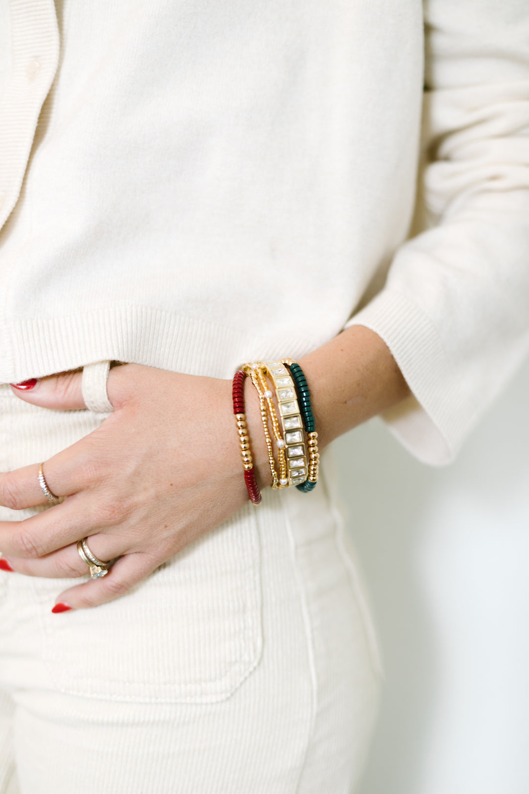 Noel bracelet stack - a combo of red, green, and gold-plated beads, with diamond bling, christmas party ready