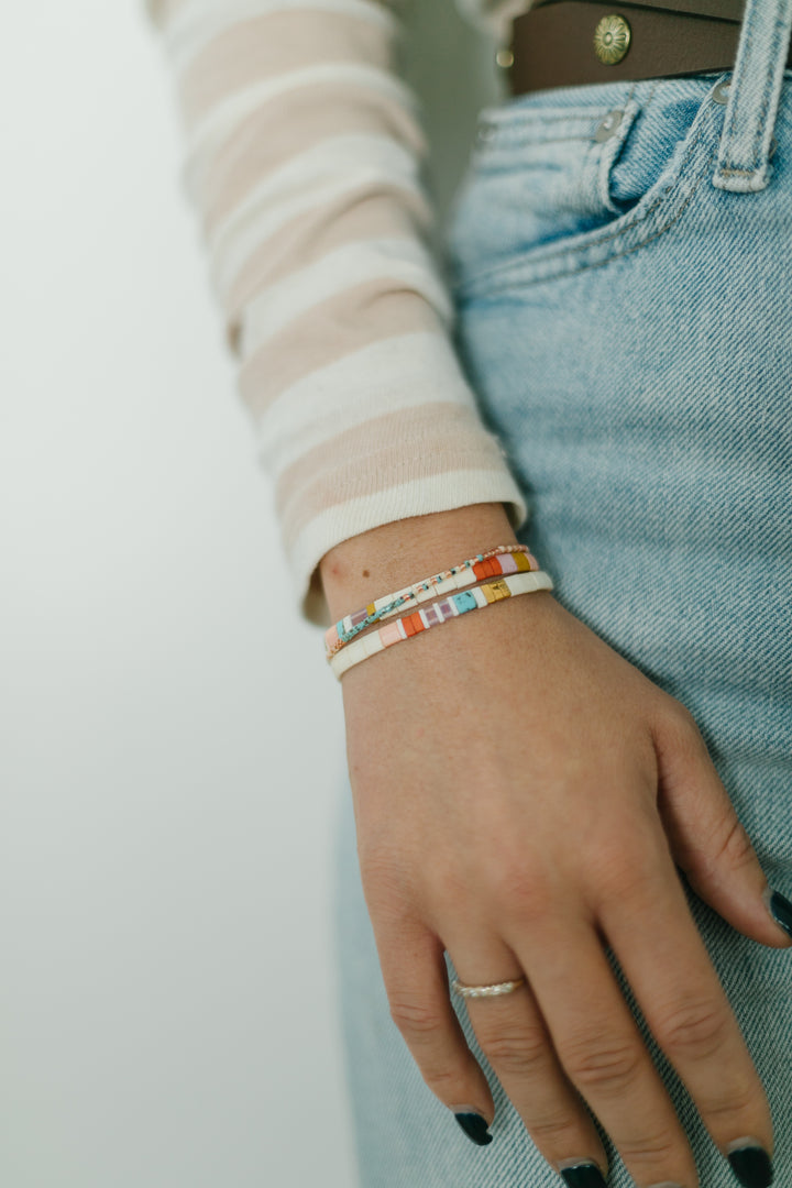 Beachy boho bracelet stacks for women. Shop jewelry for a cause and get the ENCINITAS *LUXE bracelet stack only at Current.